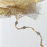 Pulsera Oro Amarillo Flores Oro Blanco y Perlas